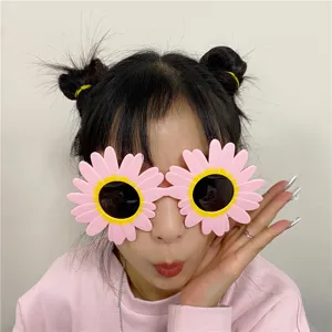 Fun pink daisy flower party sunglasses creative novelty glasses photo props for kids and adults.