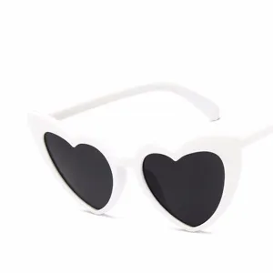 White heart shaped sunglasses for women, vintage fashion eyewear for party and daily wear.