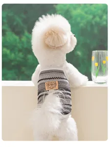 Detailed view of breathable spring summer pet vest, gray striped hollow dog clothes with cute bear patch.
