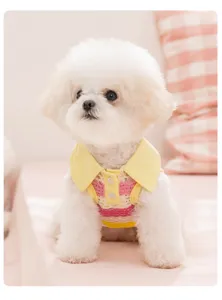 Close-up detail of breathable mesh pet tank top with cute yellow collar for small dogs and cats.