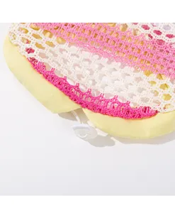 Detail view of breathable hollow mesh pet vest, summer dog clothes, yellow and pink.
