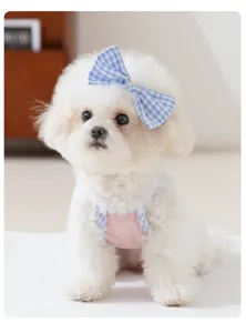 Cute pet dog summer clothes breathable small dog strap apparel with bow, perfect for daily wear.