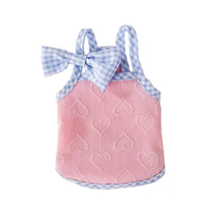 Cute summer dog strap dress with pink heart pattern and blue gingham bow for small pets.