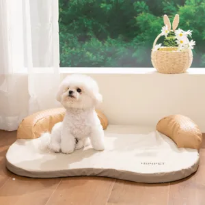 Detail view of the comfortable pet bed featuring soft fabric and woven side pillows.