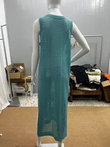 Back view of the long sleeveless hollow-out knit beach cover-up, showing texture details.
