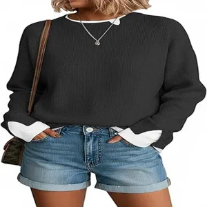 Detailed view of the casual two-piece layered knit sweater paired with denim shorts.