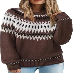 Close-up detail of the brown knit sweater featuring geometric patterns on the sleeves.