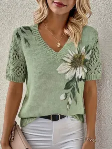 Green V-neck knit top for women featuring stylish floral print and trendy short hollow sleeves.