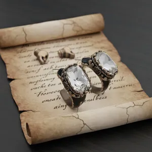 Boucles d'oreilles statement vintage avec des cristaux transparents et finition métal doré.