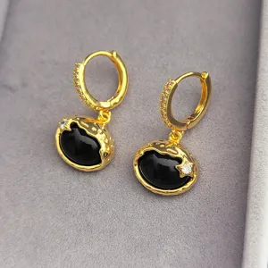 Boucles d'oreilles créoles plaquées or style vintage français pierre noire détail.