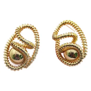 Boucles d'oreilles spirale or vintage statement métal cercles ronds bijoux femme