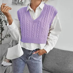 Detailed view of the stylish purple cable-knit V-neck crop sweater vest, perfect for layering.