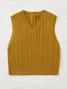 Detail view of mustard yellow V-neck cable knit sweater vest, sleeveless pullover top.