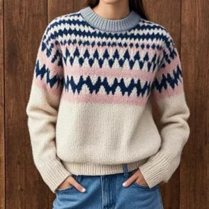 Detailed view of the women colorblock knit sweater, cozy crew neck and soft fabric.