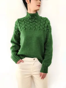 Stylish women's green turtleneck sweater with chic cable knit details and long sleeves.