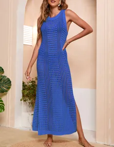 Discover this stylish blue hollow-out knit beach cover-up detail, perfect for summer days.