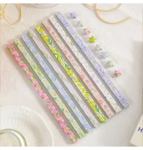 Bloem origami ster papier strips set, kleurrijke knutselstrips voor gelukssterren cadeaus.
