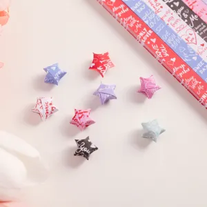 DIY origami lucky paper strips with romantic prints, perfect for handmade special love gifts.