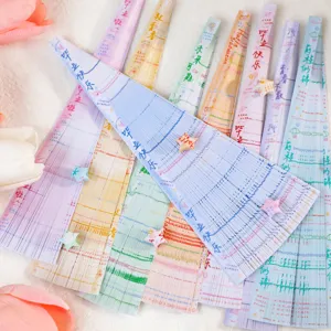 Bunte Abschluss Origami Papierstreifen für Glückssterne und inspirierende Botschaften als Geschenk.