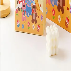 Cute cartoon children's day gift bag with lovely animal print for party and celebration use.