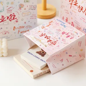 Cadeautas afstuderen papier verpakking voor schoolseizoen feest geschenken met leuke ontwerpen.