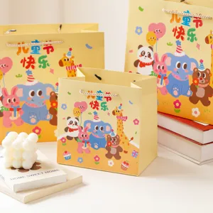 Cute cartoon children's day paper gift bag party favor packaging for kids holiday gifts.