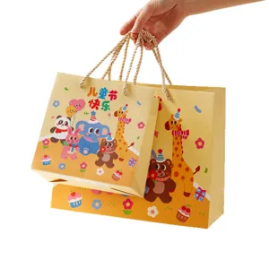 Cute cartoon children's day paper gift bag party favor packaging bag with handles.