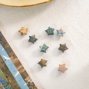 Strisce di carta per origami stella fortunata con paesaggio stile cinese tradizionale bricolage