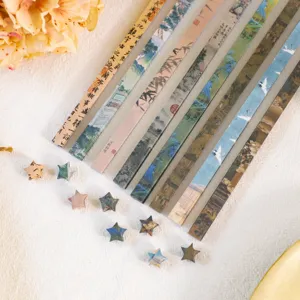 Stile cinese retro strisce di carta paesaggio e set stelle origami per artigianato fai da te.