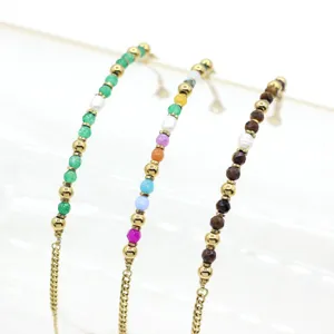 Detailed view of freshwater pearl and colorful natural stone beaded steel bracelets