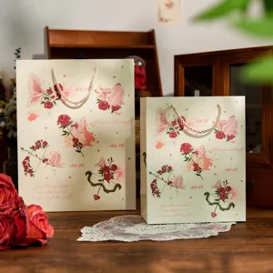 Romantische Rosen Papiertragetasche fuer Valentinstag Partygeschenk Verpackung, elegante Handtasche.