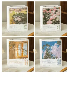 Künstlerische, heilende Geschenktüte aus Papier, zarte Gestaltung mit poetischen Zitaten.