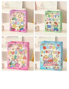 Cute cartoon paper gift bags with handles, perfect for birthday party favors and holiday presents.