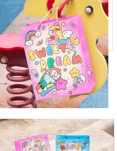 Cute pink cartoon gift bag with unicorn and monkey design, perfect for birthday party gifts.