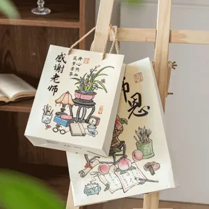 Sacs cadeaux en papier de style chinois pour enseignants avec calligraphie et art floral.