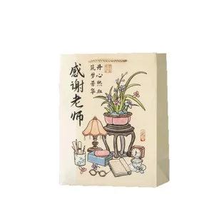Sac cadeau en papier de style chinois traditionnel avec calligraphie pour les enseignants.