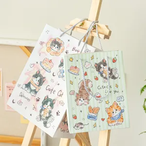 Süße Cartoon Katze Papiertragetasche mit Kordel, ideal für Geburtstagsgeschenke und schöne Deko.