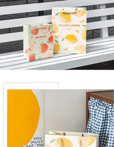 Summer fresh fruit gift paper bags detail shot, featuring cute peach and lemon pattern designs.