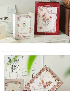 Bolsas de papel de regalo de rosa y mariposa, bolsos elegantes para empaque festivo y almacenamiento.