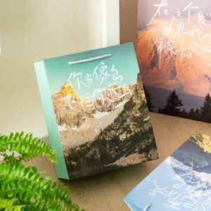 Landscape inspirational gift paper bag with handles, ideal for birthday or flower packaging.