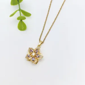 Collana con ciondolo a fiore dorato in acciaio inossidabile con zirconi viola.