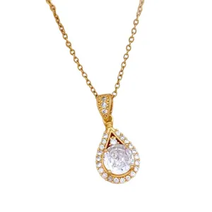 Collana con ciondolo a goccia dorata con pietre zirconi scintillanti per donne eleganti.
