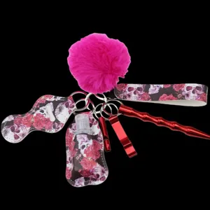 Completo set portachiavi di sicurezza da donna con laccetto da polso, pon pon e flacone.