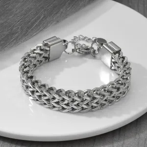 Stainless steel multi-layer chain bracelet for women, chic silver stackable wrist jewelry.