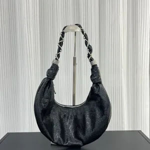 Black crescent hobo shoulder bag with chain leather braided strap for women stylish daily use.