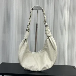White leather crescent shoulder bag with chain strap and metal rings for women chic daily.