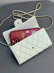 White quilted chain crossbody bag, elegant lambskin leather mini phone bag for women.