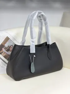 Black genuine leather tote bag for women, stylish minimalist shoulder handbag daily wear.
