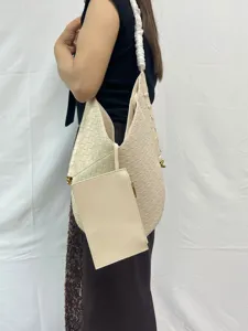 Soft woven shoulder bag with matching pouch, large capacity PU leather tote for daily use.
