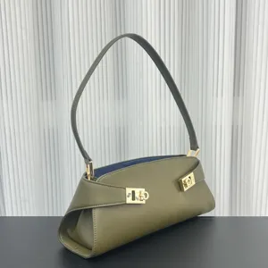 Olive green leather baguette shoulder bag with gold hardware detail, chic women daily purse.